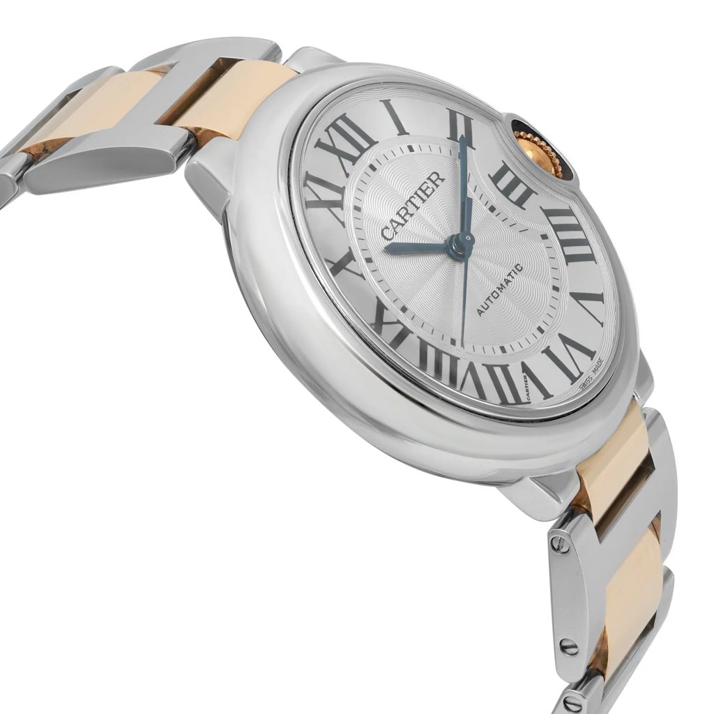 An image of a pre-owned wristwatch captured from a side profile view opposite the crown. The watch features a polished silver case and a two-tone metal bracelet with silver and gold links. The dial displays Roman numerals with elegant blue hands, partially visible at an angle, showcasing its classic design.