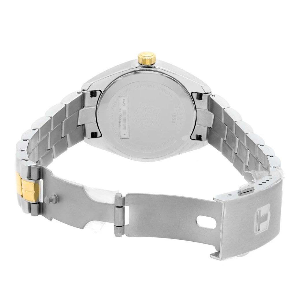 An image of a Wristwatch by Tissot. This Pre Owned item is designed for Women, featuring a Casual style. It has a Quartz movement and an Analog display with a Silver dial color. The indices include 12-Hour Dial,Stick Indexes. The band is made of Stainless Steel and the case is made of Stainless Steel. The watch has a Round shape with a case size of 33 mm and a case thickness of 9 mm.