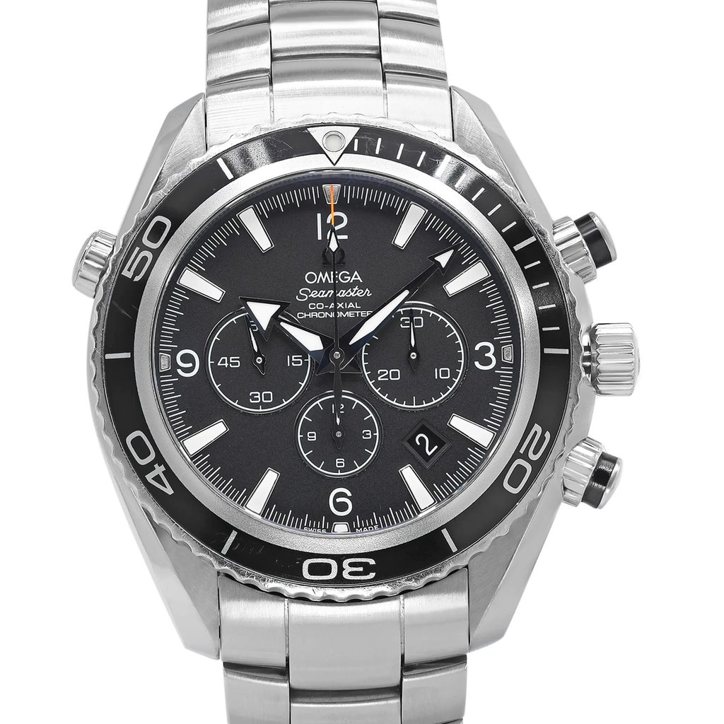An image of a pre-owned men's OMEGA wristwatch taken from a close-up, frontal angle. The watch features a stainless steel band and a black dial with chronograph sub-dials, a date indicator, and luminous hands. The bezel is marked with minute indicators, and the brand name is visible on the face.