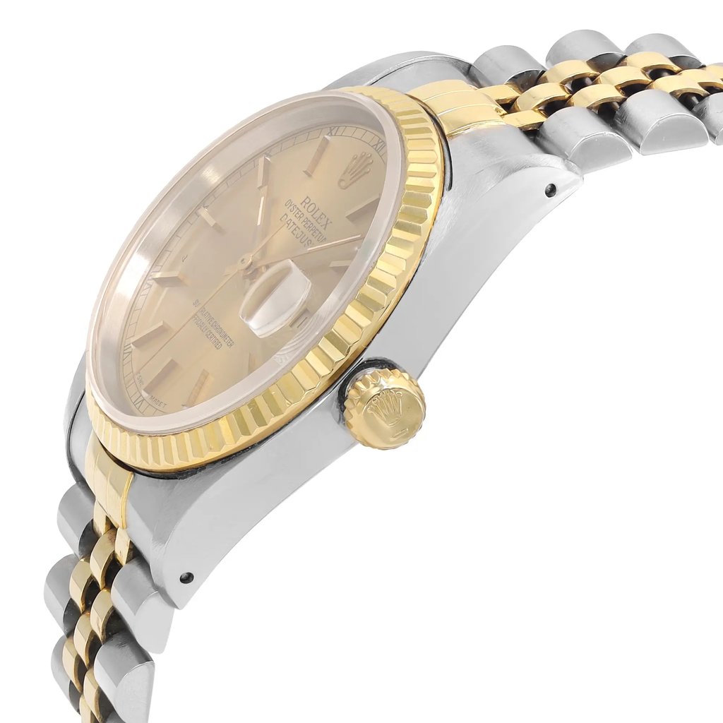 An image of a pre-owned wristwatch shown from a side profile view. The focus is on the crown, which is prominently visible. The watch features a two-tone metal design with a gold bezel and a silver case. The watch face is beige with hour markers. The band is a combination of gold and silver links. The angle highlights the watch's elegant design from a close distance.