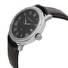 An image of a Wristwatch by RAYMOND WEIL. This Display Model item is designed for Men, featuring a Casual style. It has a Mechanical (Automatic) movement and an Analog display with a Gray dial color. The indices include 12-Hour Dial,Roman Numerals. The band is made of Leather and the case is made of Stainless Steel. The watch has a Round shape with a case size of 39 mm and a case thickness of 9.5 mm.