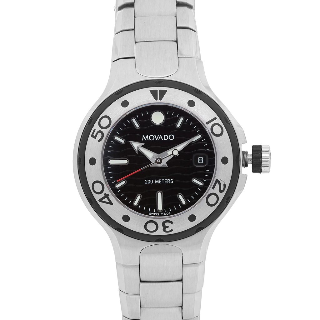 An image of a pre-owned wristwatch, taken from a front close-up angle. The watch face is prominently displayed, showcasing a black dial with silver hour markers and hands. The bezel features numerals at intervals of ten. The watch is equipped with a stainless steel bracelet, and the brand name is visible on the dial.