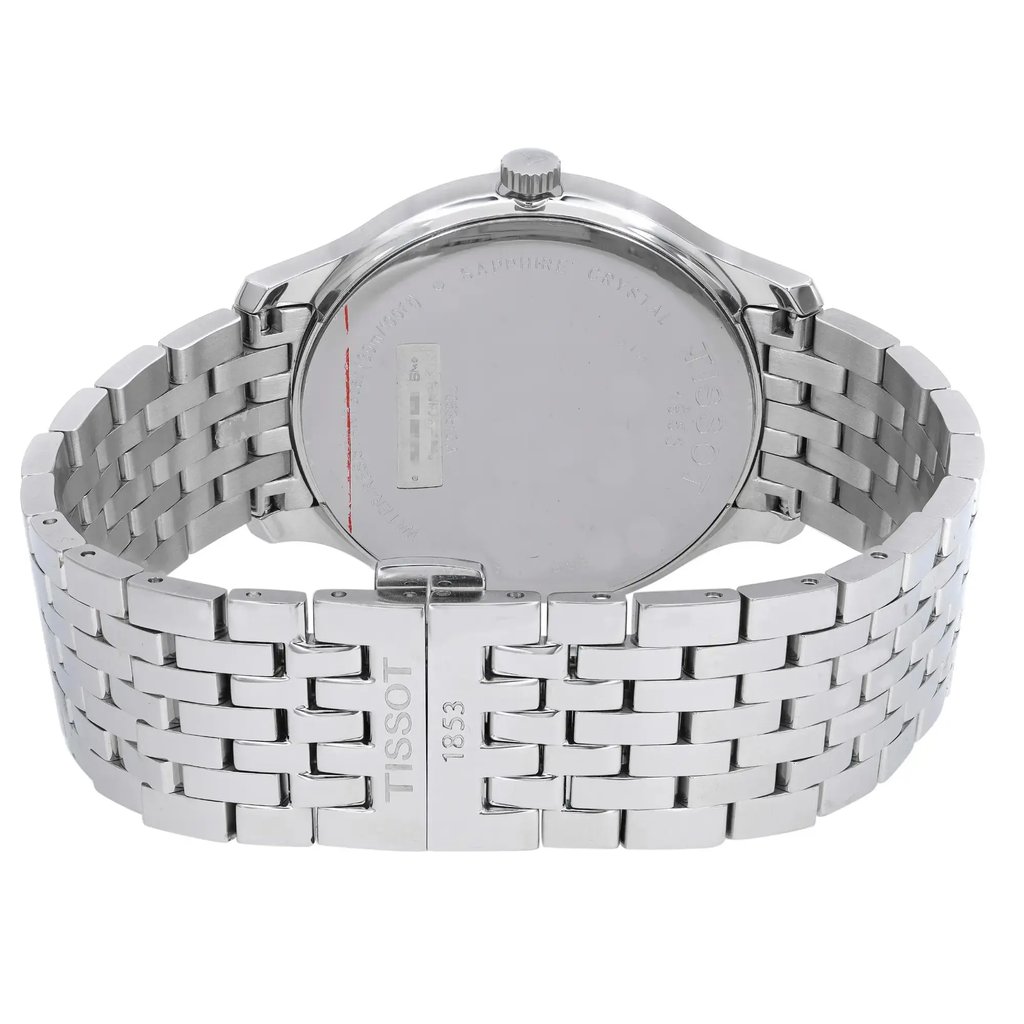 An image of a Wristwatch by Tissot. This Display Model item is designed for Men, featuring a Casual style. It has a Quartz movement and an Analog display with a Black dial color. The indices include 12-Hour Dial,Stick Indexes. The band is made of Stainless Steel and the case is made of Stainless Steel. The watch has a Round shape with a case size of 42 mm and a case thickness of 6 mm.
