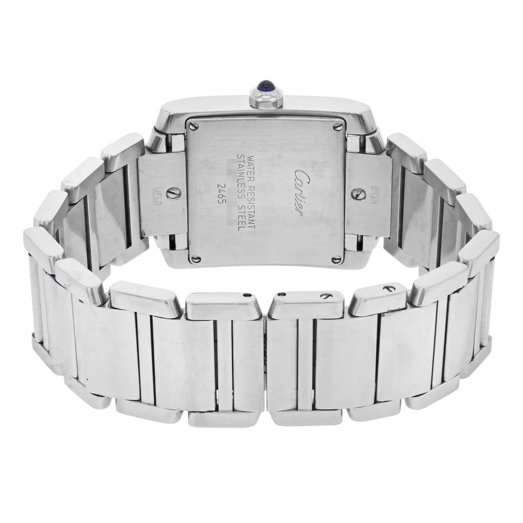 An image of a pre-owned Cartier women's wristwatch viewed from the back. The watch is positioned upright, showing the stainless steel case and bracelet at a slight angle. The focus is on the engraved details on the case back, with the entire watch band visible. The watch is shown at a close distance, highlighting its polished metal links and the blue cabochon on the crown.