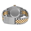 An image of a pre-owned men's Rolex wristwatch viewed from the back. The angle captures the screwback case and the fold-over clasp in a closed position. The watch features a round stainless steel case and a band composed of stainless steel and solid gold links. The close-up perspective highlights the intricate details of the band and clasp.