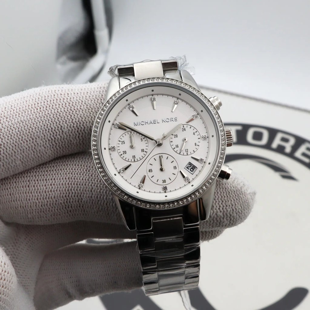 Back View Of Solid Back Case And Open Stainless Steel Band Of Michael Kors MK6428 Watch Display Model Condition