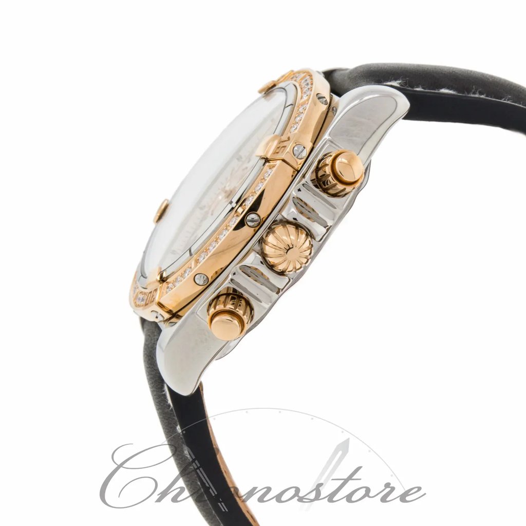 View Of Crown Facing Side Of Breitling C1335653 Rose Gold Watch Unworn Condition