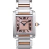 An image of a pre-owned Cartier luxury wristwatch for women, presented in a front close-up view showcasing the watch face. The watch features a mother of pearl dial, adorned with Roman numeral indices for a 12-hour display. A rectangular stainless steel case surrounds the dial, complemented by a steel bezel. The band is made of alternating rose gold and stainless steel links. The watch is in good condition and the image is taken from a direct, head-on angle, with the watch occupying the central portion of the frame.