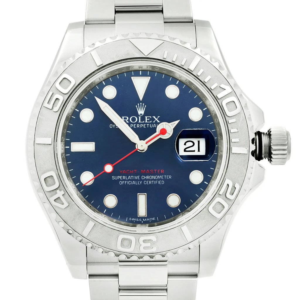 An image of a pre-owned wristwatch featuring a detailed, front close-up shot of the watch face. The watch has a blue dial with silver and white hour markers and hands, and a date display at the three o'clock position. The bezel is marked with numerals, and the watch has a metallic bracelet. The angle is straight on, providing a clear and direct view of the timepiece's face and features.