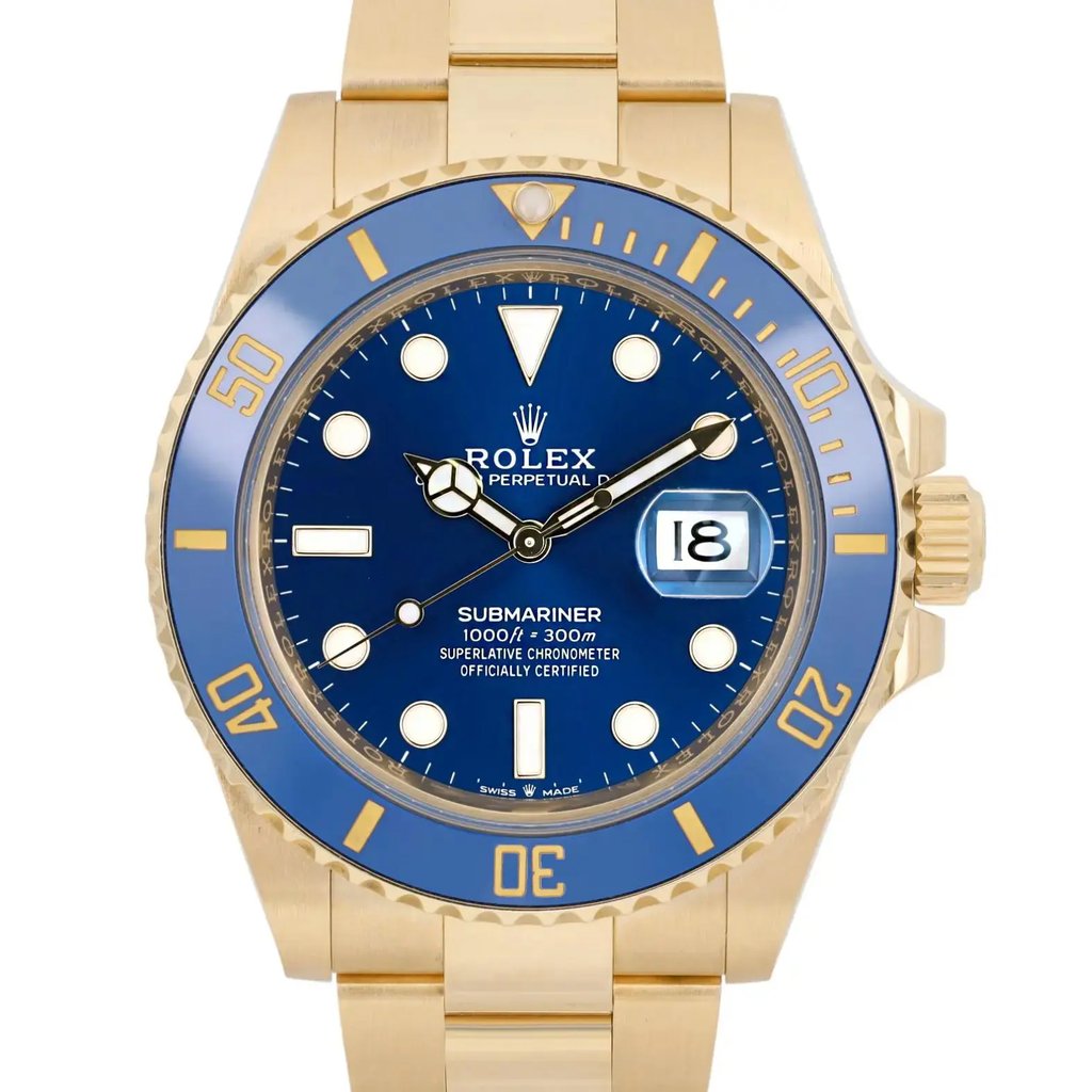 An image of a pre-owned men's Rolex wristwatch, captured from a front-facing angle at a close distance. The watch features a blue dial with luminous hands and a date indicator. The gold-tone bezel and matching bracelet are prominently visible, highlighting the watch's elegant design.