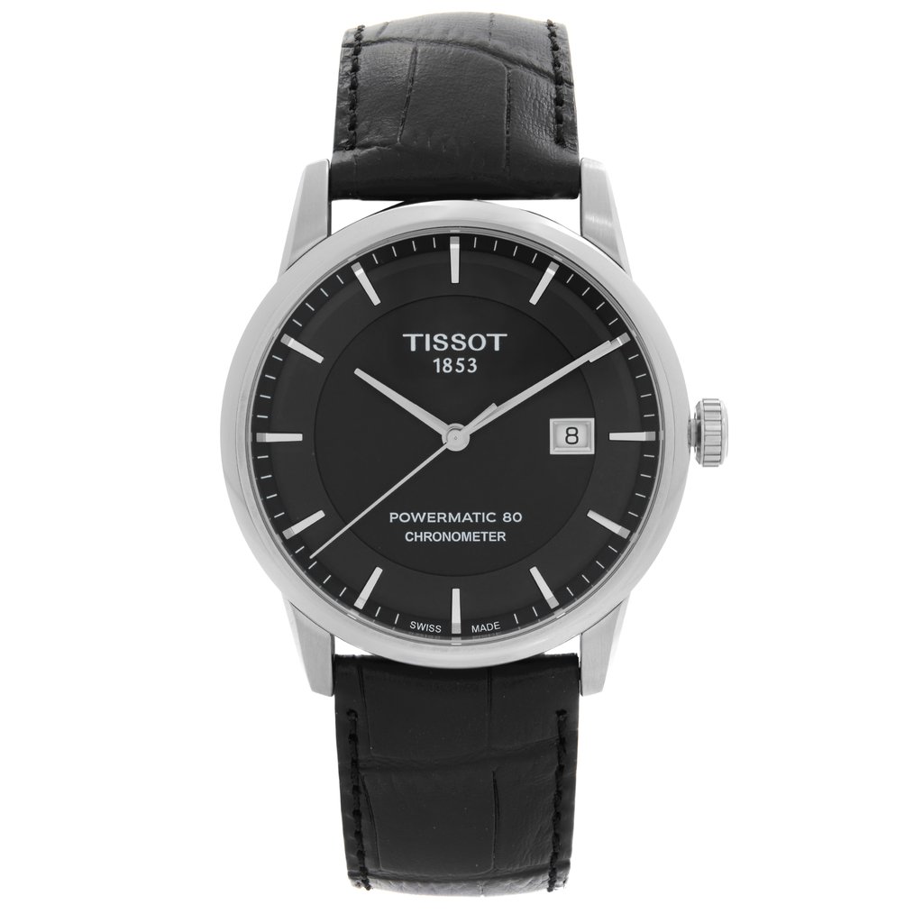 An image of a Wristwatch by Tissot. This New With Defects item is designed for Men, featuring a Dress/Formal style. It has a Mechanical (Automatic) movement and an Analog display with a Black dial color. The indices include 12-Hour Dial,Non-Numeric Hour Marks,Stick Indexes. The band is made of Leather and the case is made of Stainless Steel. The watch has a Round shape with a case size of 41 mm and a case thickness of 10 mm.