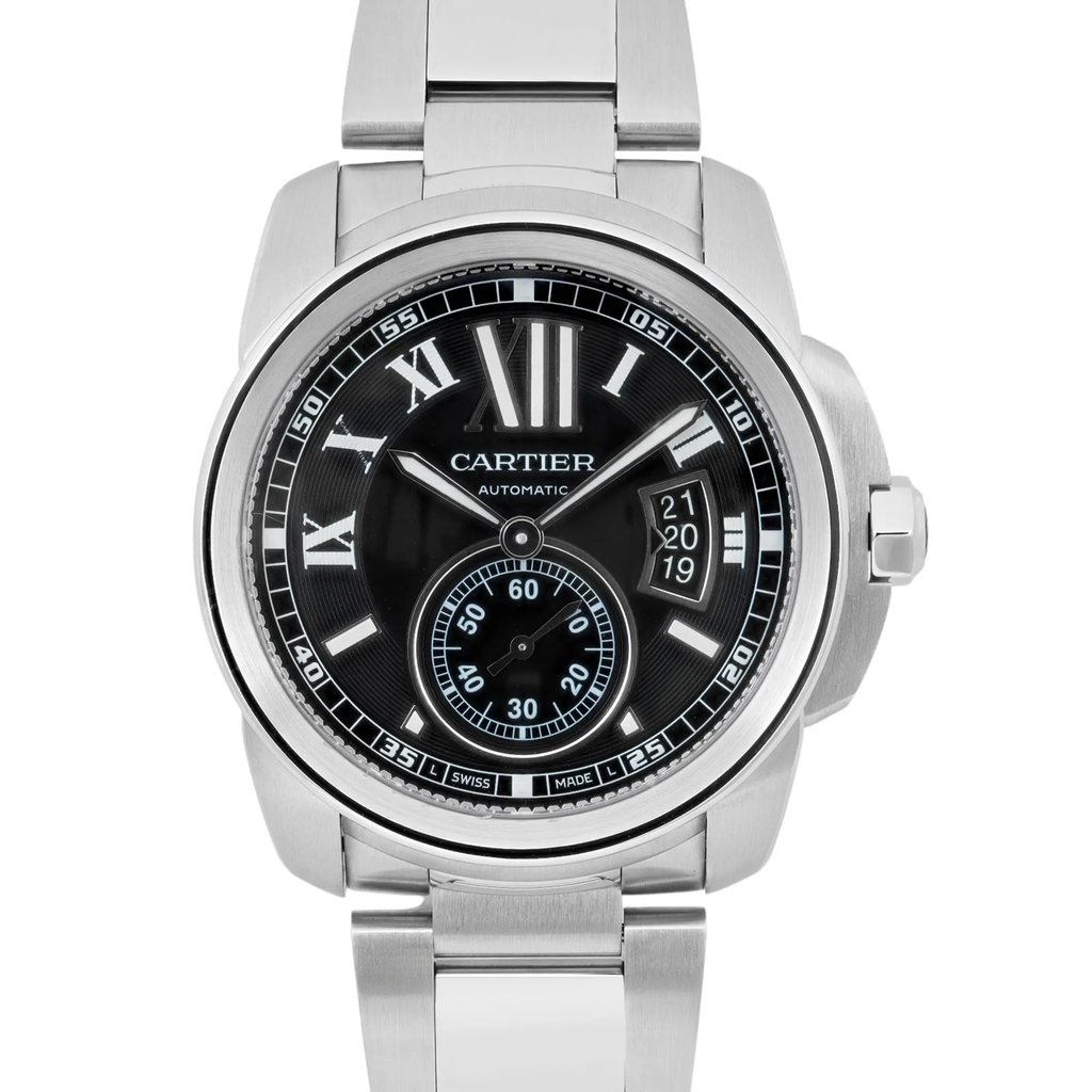 An image of a pre-owned Cartier men's wristwatch taken from a front-facing angle at a close distance. The watch features a sleek silver metal band and a black dial with Roman numeral hour markers. It includes a date indicator at the 3 o'clock position and luminous hands. The brand name "Cartier" and "Automatic" are displayed prominently on the dial.