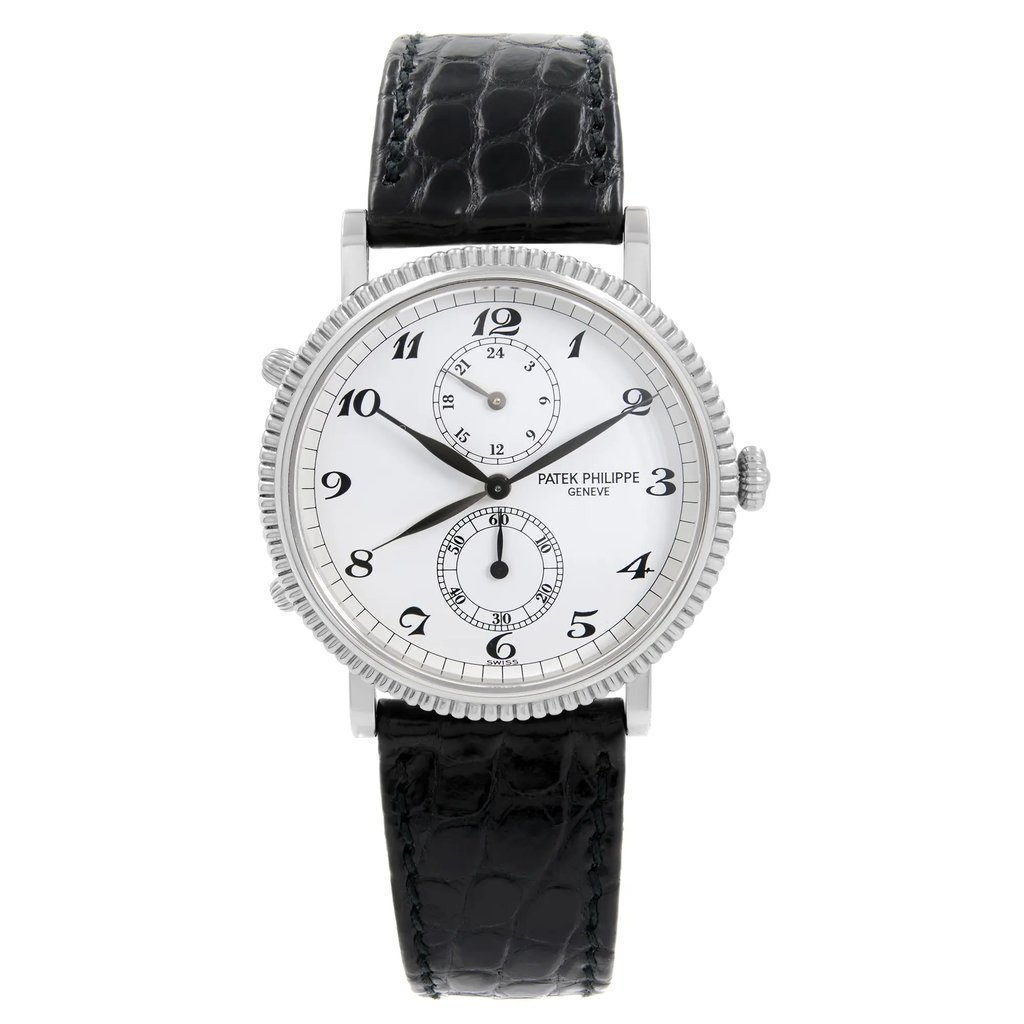 An image of a pre-owned wristwatch displayed from a front full-frontal view. The watch features a white dial with black numerals and two subdials. It has a textured black leather strap and a polished metal case. The image is taken close-up, highlighting the watch's intricate details.
