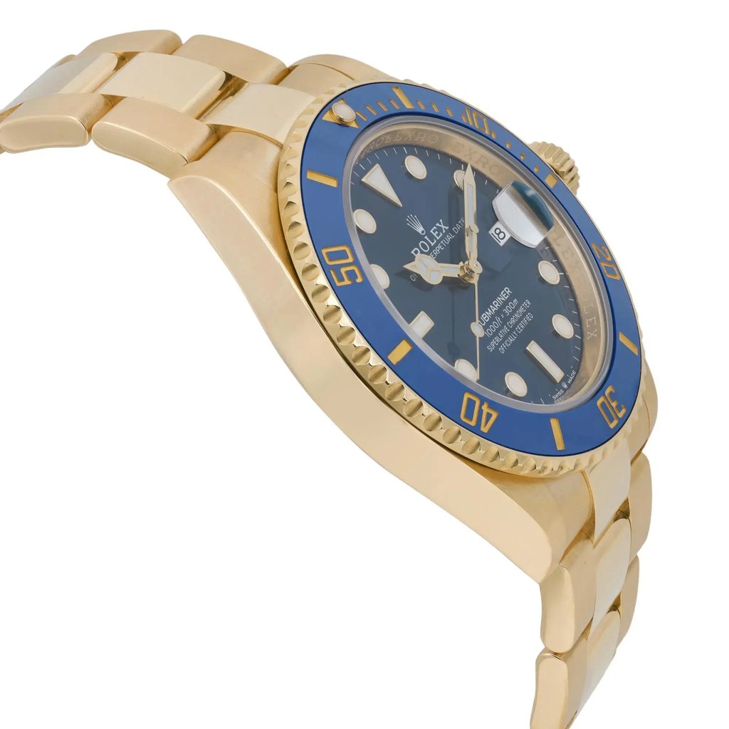 An image of a pre-owned men's Rolex wristwatch, viewed from a slightly elevated angle on the left side. The watch features a gold band and case with a blue bezel and dial. The luminous hands and date indicator are visible on the face. The perspective highlights the watch's side profile, showcasing its elegant design and craftsmanship from a close distance.