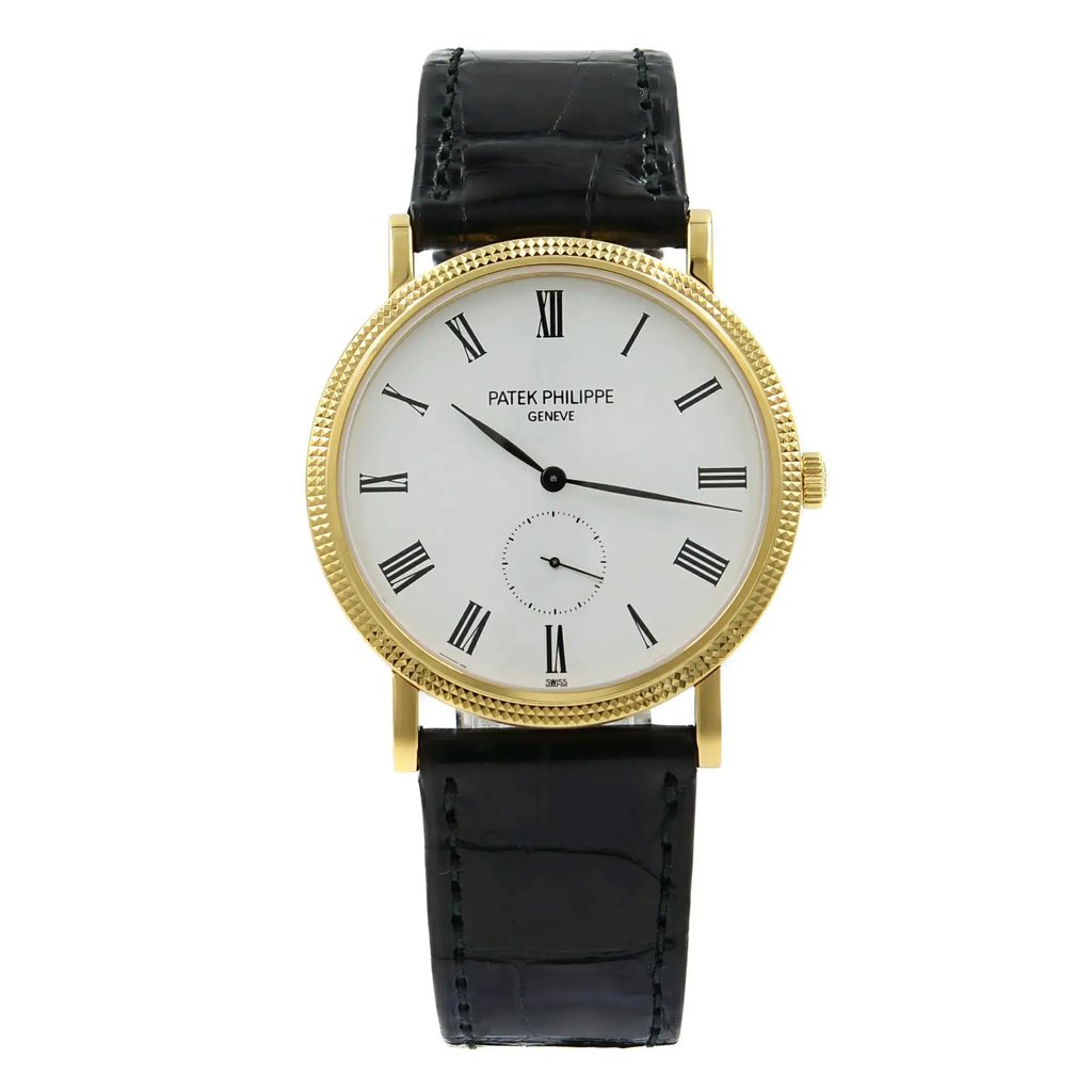 An image of a pre-owned wristwatch viewed from a front full frontal angle. The watch features a round, gold-toned case with a textured bezel. It has a white dial with black Roman numerals and sleek black hands. There is a small sub-dial located near the 6 o'clock position. The watch is attached to a black leather strap. The photograph captures the watch from a close distance, highlighting its elegant design and classic details.
