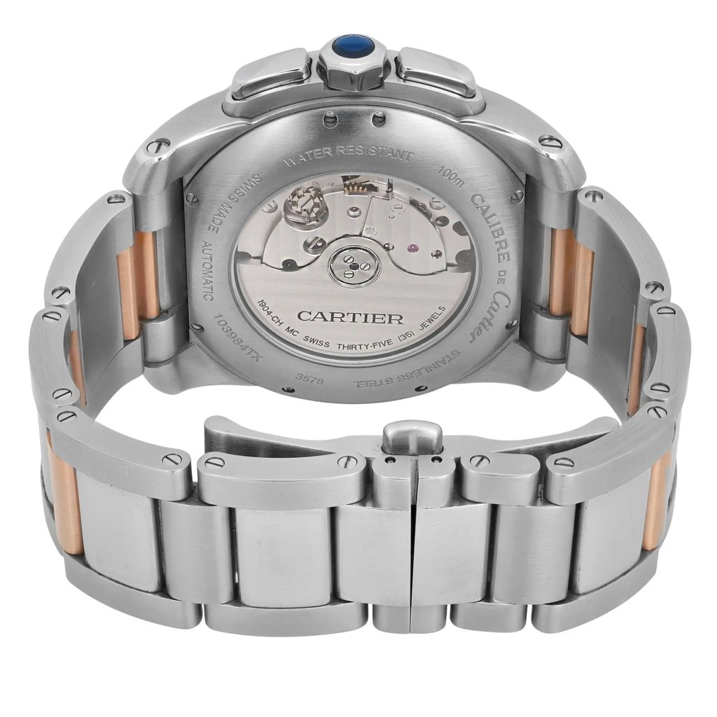 An image of a pre-owned Cartier men's wristwatch, viewed from the back. The watch is positioned upright, showcasing the intricate mechanical movement through a transparent case back. The angle captures the full bracelet and the crown adorned with a blue cabochon. The watch features a combination of steel and rose gold links, emphasizing its luxurious design. The image is taken at a close distance, highlighting the craftsmanship and detail of the watch's components.