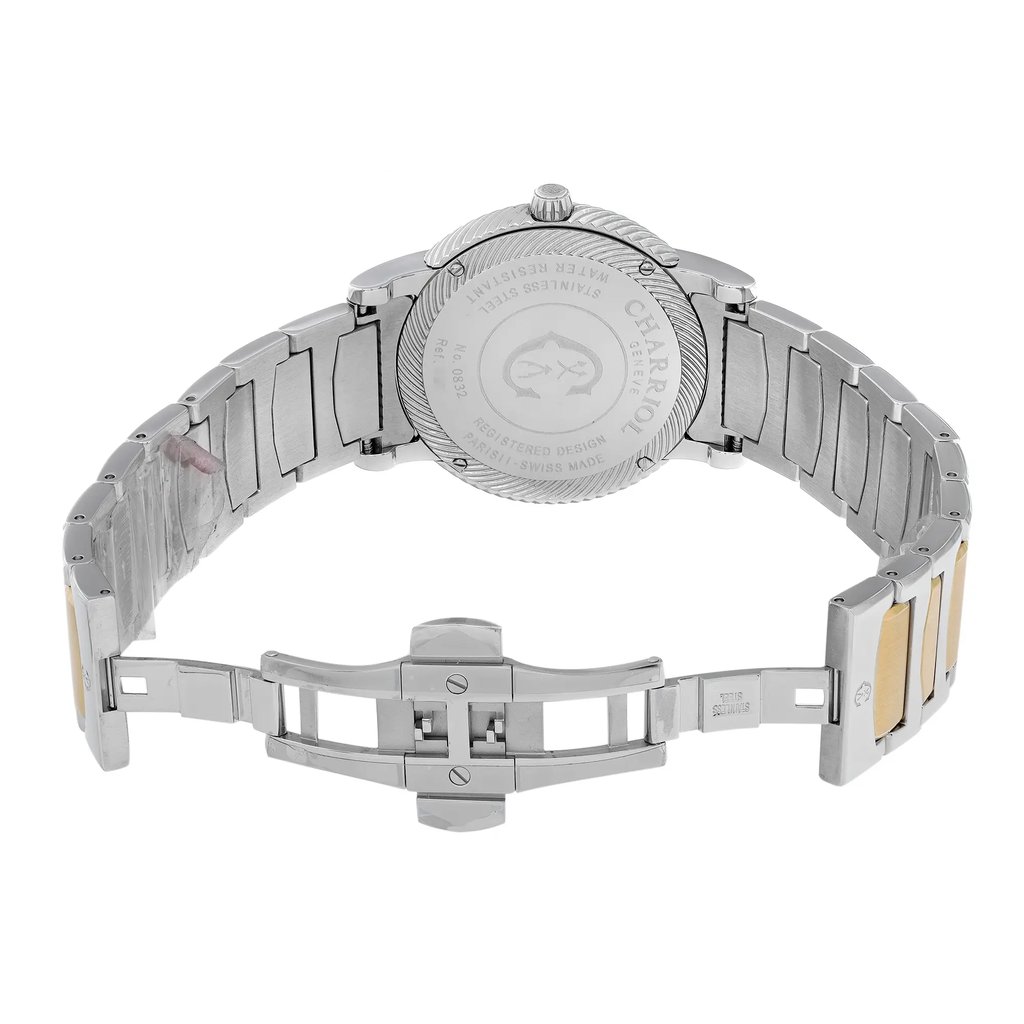 An image of a wristwatch displaying a back view with an open clasp. The watch is a display model, showcasing a metallic band with both silver and gold-toned links. The image is taken from a close angle, capturing the intricate clasp mechanism and the engraved details on the back of the watch case.