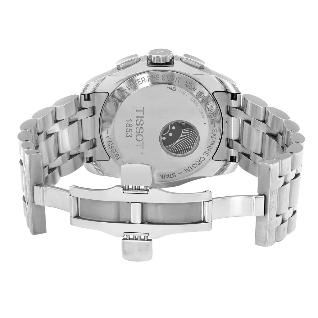 An image of a Wristwatch by Tissot. This Pre Owned item is designed for Men, featuring a Casual style. It has a Mechanical (Automatic) movement and an Analog display with a White dial color. The indices include 12-Hour Dial,Baton Indexes,Seconds Hand. The band is made of Stainless Steel and the case is made of Stainless Steel. The watch has a Round shape with a case size of 43 mm and a case thickness of 15 mm.