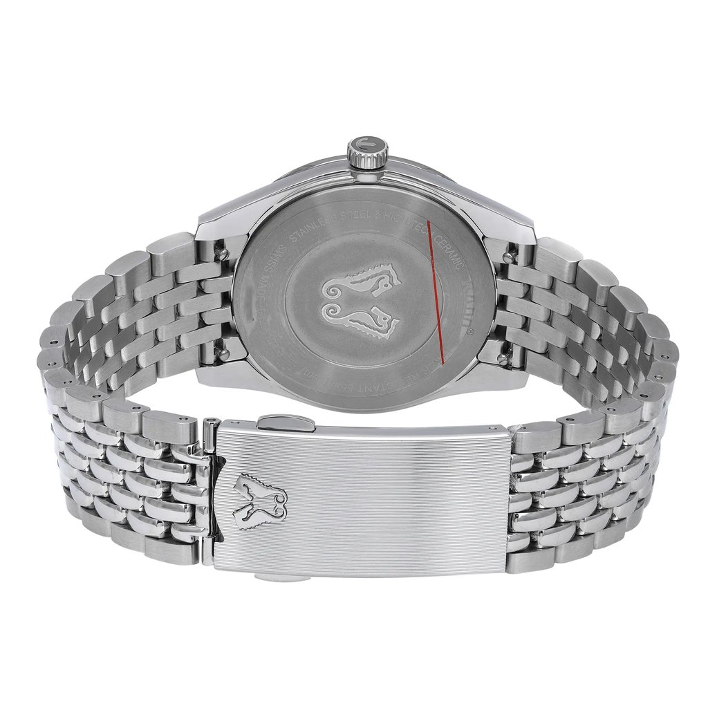 An image of an unworn Rado women's wristwatch, focused on the back view with the clasp closed. The watch features a round stainless steel case with a snap caseback and a stainless steel band. The band has a fold-over clasp with a double push-button closure, visible in the foreground. The photograph is taken from a close distance, showing the watch at a slight angle to display both the caseback and the side profile of the band.