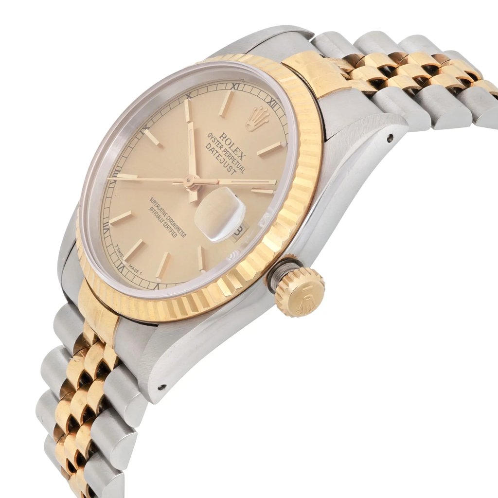 An image of a pre-owned men's Rolex wristwatch taken from a slightly elevated angle, showcasing the side and part of the face. The watch features a gold and stainless steel two-tone bracelet and a gold bezel. The face is beige with a date indicator and luminous hands. The crown is visible on the right side. The shot is taken from a medium distance, highlighting the watch's elegant design and details.
