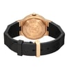 An image of a pre-owned Bvlgari men's wristwatch showcasing the back view. The watch has a round case made of yellow gold with a screwback featuring the brand's engravings. It is attached to a rubber black band and the yellow gold deployant clasp is visible and closed. The perspective is a close-up at a straight angle, emphasizing the details of the case back and clasp. The band shows minor signs of wear and light signs of scratches.