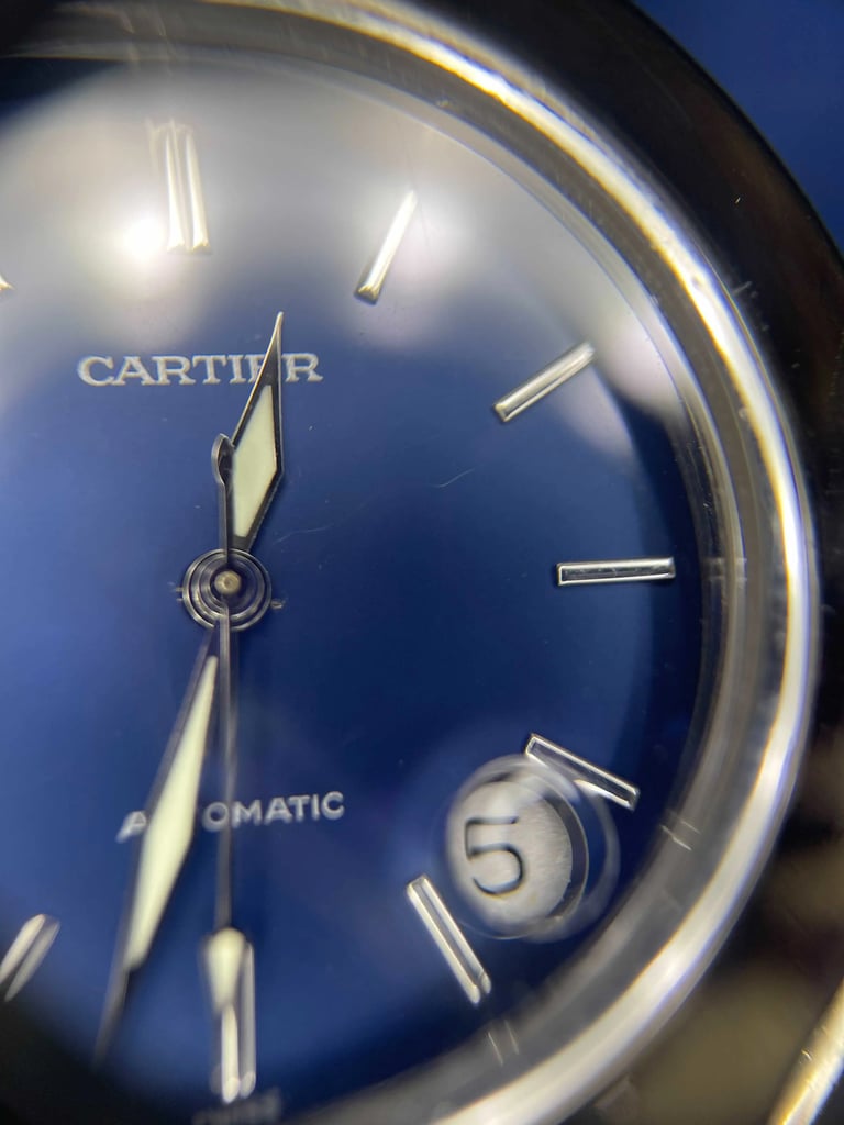 Up Close Front Facing Picture Of Cartier W31014M7 Stainless Steel Watch Pre Owned Condition