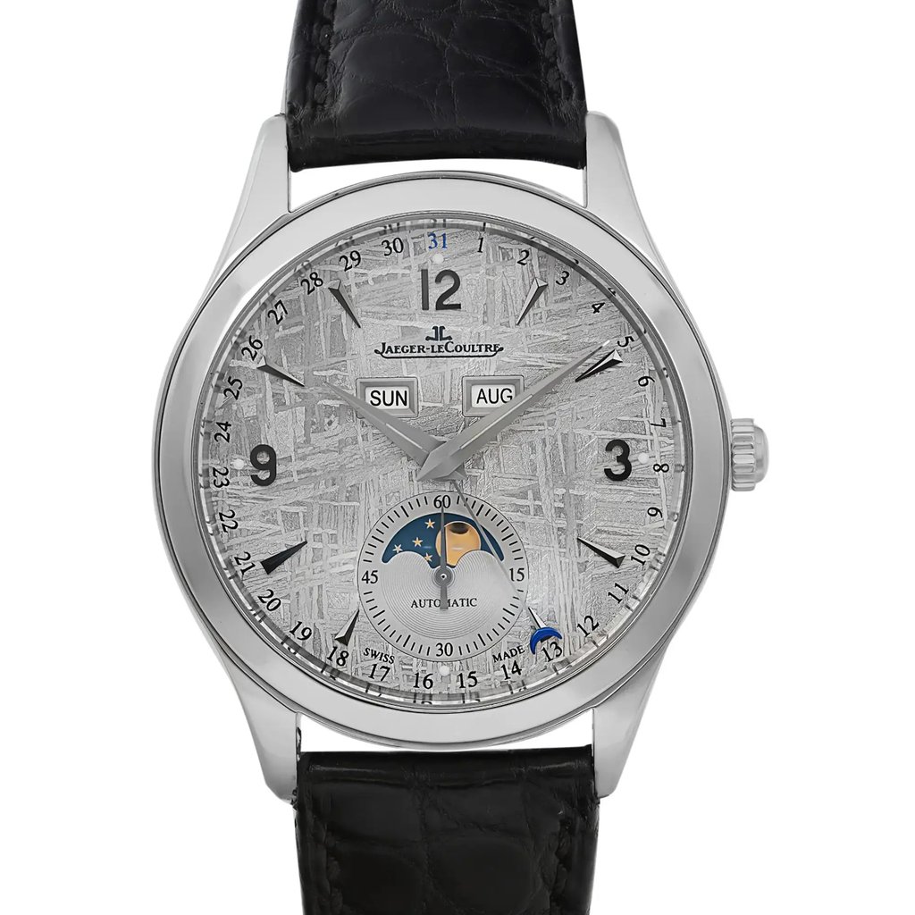 An image of a pre-owned Jaeger-LeCoultre luxury men's wristwatch, presented in an excellent condition with a front close-up view of the watch face. The watch has a round stainless steel case with a gray bezel and a silver meteorite dial pattern. It features Arabic numerals, stick indexes, and a 12-hour dial with a moon phase and a small seconds subdial. The watch is attached to a black leather band and shows light signs of wear or scratches. The photo is taken from a straight-on angle, focusing closely on the watch face to capture the details.