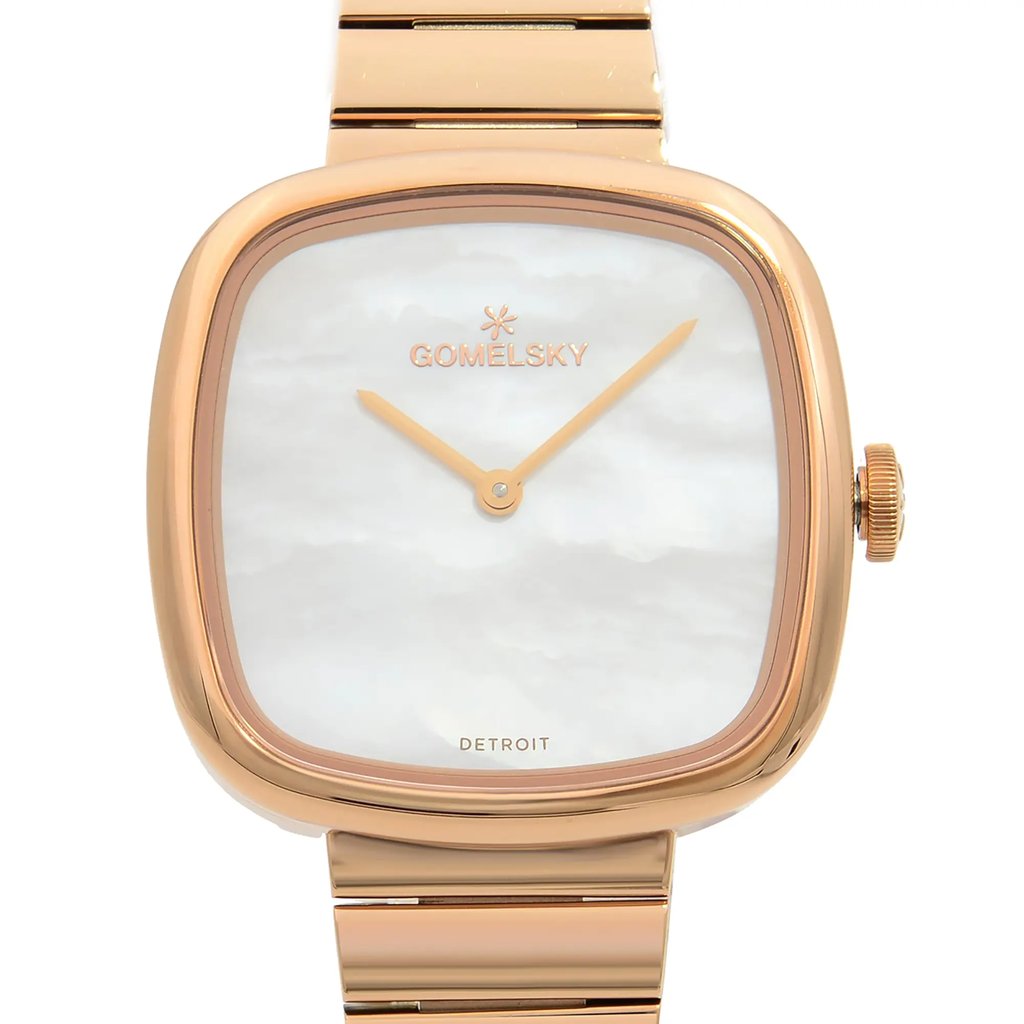 An image of a wristwatch featuring a close-up front view of the watch face. The unworn watch has a square-shaped gold-tone case with a smooth finish. The dial is a subtle mother-of-pearl, with gold hands and the brand name "Gomelsky" positioned near the 12 o'clock mark. The crown is visible on the right side, and the gold bracelet is partially visible at the top and bottom edges of the image.