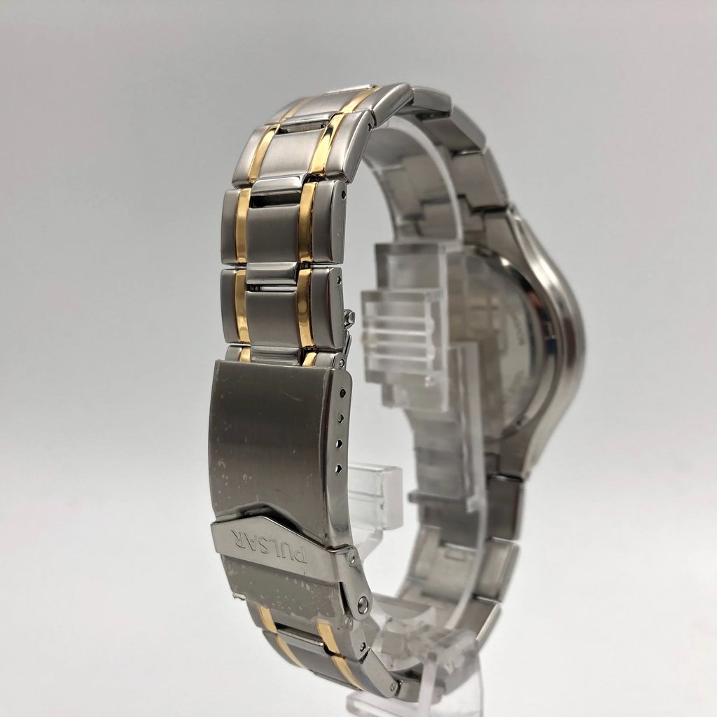 Back View Of {Caseback} Back Case And Closed Stainless Steel Band Of Pulsar PXH097 Watch Unworn Condition
