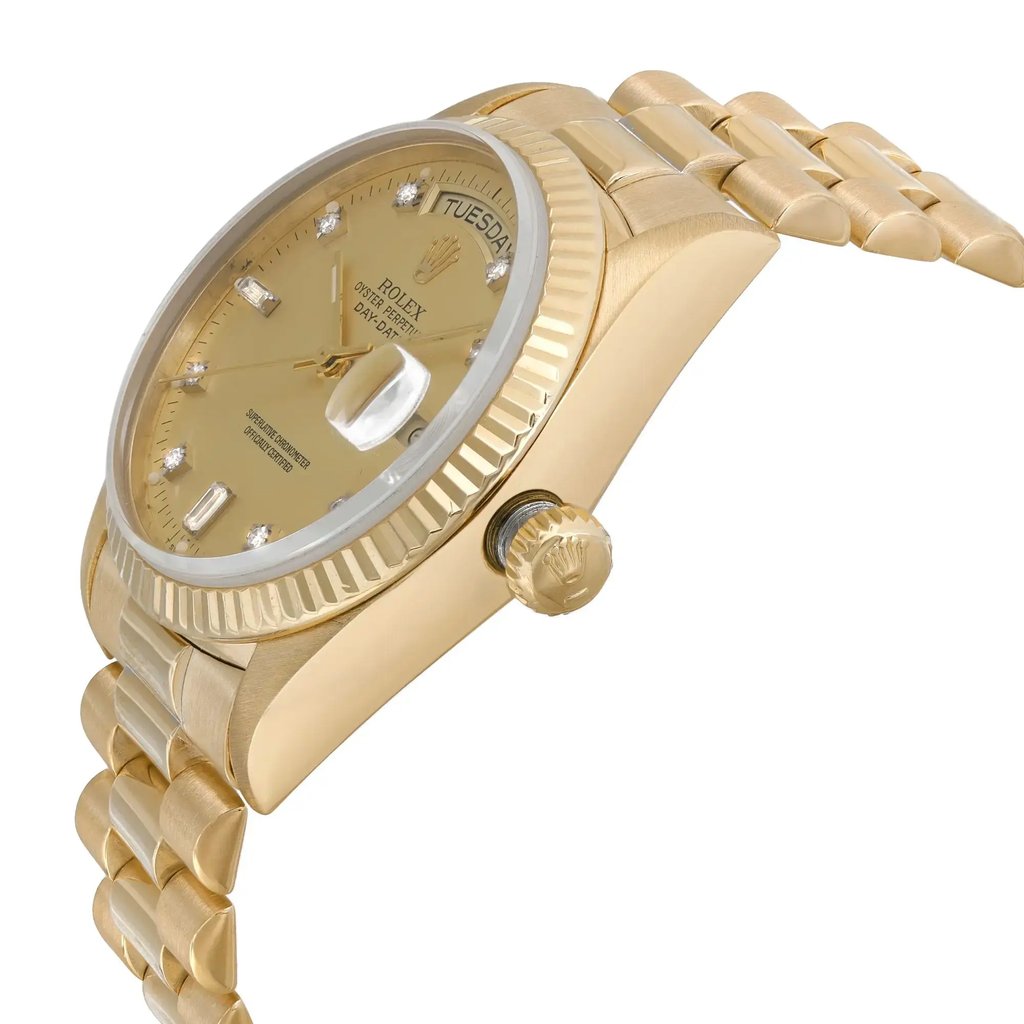 An image of a pre-owned Rolex men's wristwatch, showcasing a side profile view with the crown visible. The watch features a luxurious design with a round shape, gold sunburst dial, day/date function, and luminous hands. It has a yellow gold case and band, with the bezel also in gold. The piece is captured from a close distance, highlighting the details of the watch's side and texture of the band.
