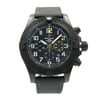 An image of a wristwatch taken from a front full frontal view. The watch is a display model with a black dial featuring white numerals and hands, and additional sub-dials. The case is dark-colored with textured details, and the band appears to be fabric. The image is captured at eye level, providing a clear, direct view of the watch face and strap.