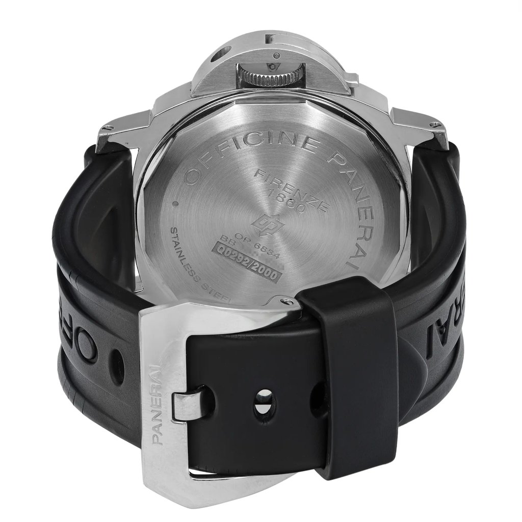 An image of a pre-owned Officine Panerai men's wristwatch, showcasing the back view with a closed clasp. The watch features a cushion-shaped stainless steel case with a solid case back, engraved with the brand's name and other details. Attached is a black rubber band with a buckle closure. The image is taken from a top-down angle, centered and at a close distance, emphasizing the case back and clasp which display some scratches indicative of previous wear.