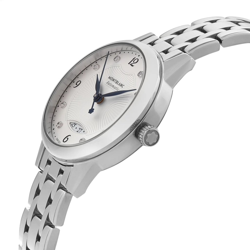 An image of a wristwatch in a side profile view, showcasing its polished metal case and bracelet. The watch face is angled slightly upward, revealing the elegant design with a visible crown on the right side. The dial features a clean layout with delicate markings and is complemented by sleek watch hands. The watch is depicted as a display model, positioned at a close distance to highlight its intricate details and craftsmanship.