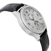 An image of a pre-owned Jaeger-LeCoultre men's luxury wristwatch, positioned at a side profile view opposite of the crown, showcasing its round stainless steel case and gray bezel. The watch has a silver meteorite dial with a moon phase feature and a small seconds subdial, complemented by a black leather band. The image is taken at a close distance, allowing for a clear view of the watch's side, with visible light signs of wear and minor scratches.
