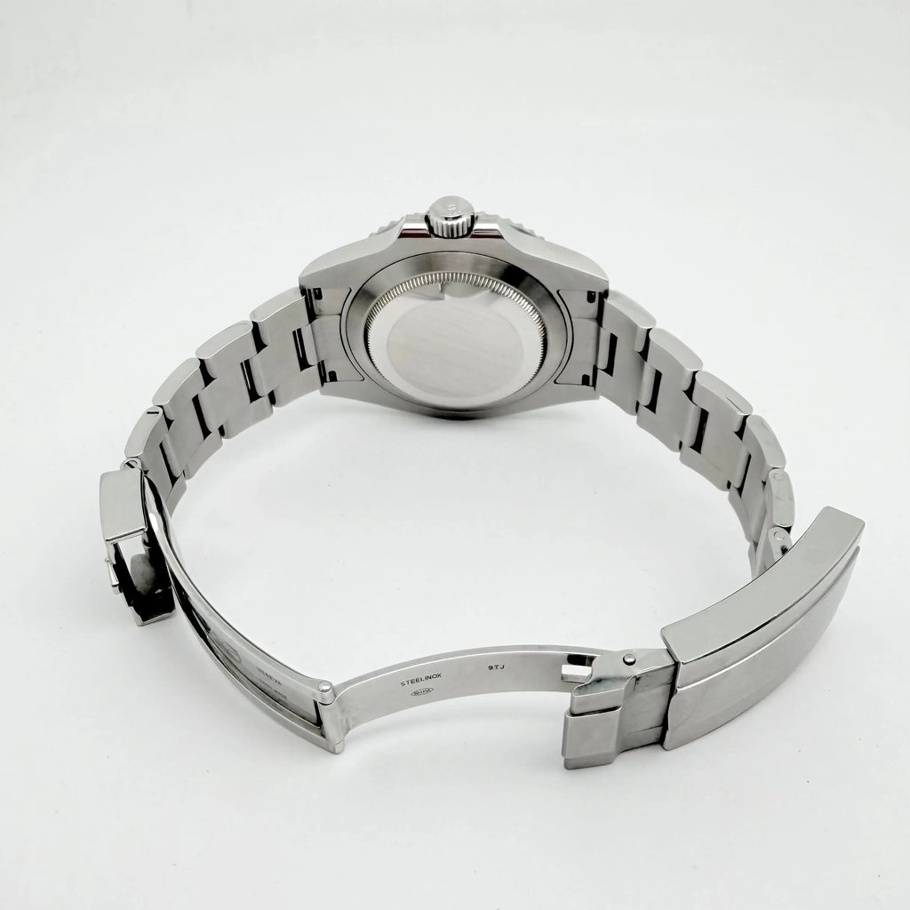 Back View Of Solid Back Case And Open Stainless Steel Band Of Rolex 126610LV Watch Pre Owned Condition