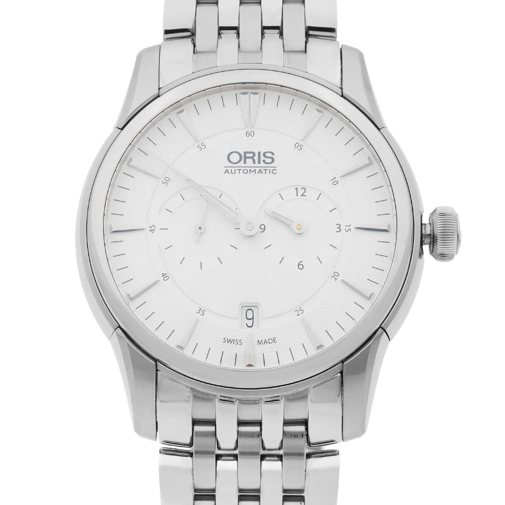 An image of a pre-owned wristwatch taken from a front close-up angle, focusing on the watch face. The watch features a sleek silver band and a white dial with two subdials, displaying a minimalist yet elegant design. The brand name "Oris" and "Automatic" are visible on the upper portion of the face, with a date window at the 6 o'clock position. The watch hands and hour markers are clearly detailed, enhancing its sophisticated appearance.