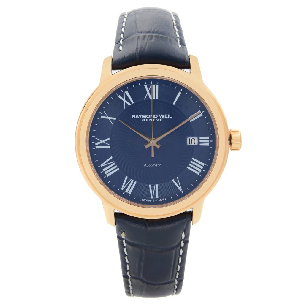An image of a Wristwatch by RAYMOND WEIL. This Display Model item is designed for Men, featuring a Dress/Formal style. It has a Mechanical (Automatic) movement and an Analog display with a Blue dial color. The indices include 12-Hour Dial,Roman Numerals. The band is made of Leather and the case is made of Rose Gold Plated,Stainless Steel. The watch has a Round shape with a case size of 39.5 mm and a case thickness of 10 mm.