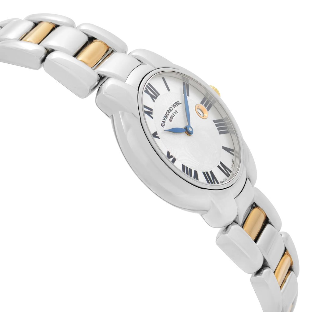 An image of a luxury women's wristwatch by RAYMOND WEIL, shown from a side profile view opposite the crown. The unworn watch features a round stainless steel case with a gray bezel. The dial is silver with a date indicator, and the band is a combination of stainless steel links. The angle highlights the watch's elegant design and craftsmanship.