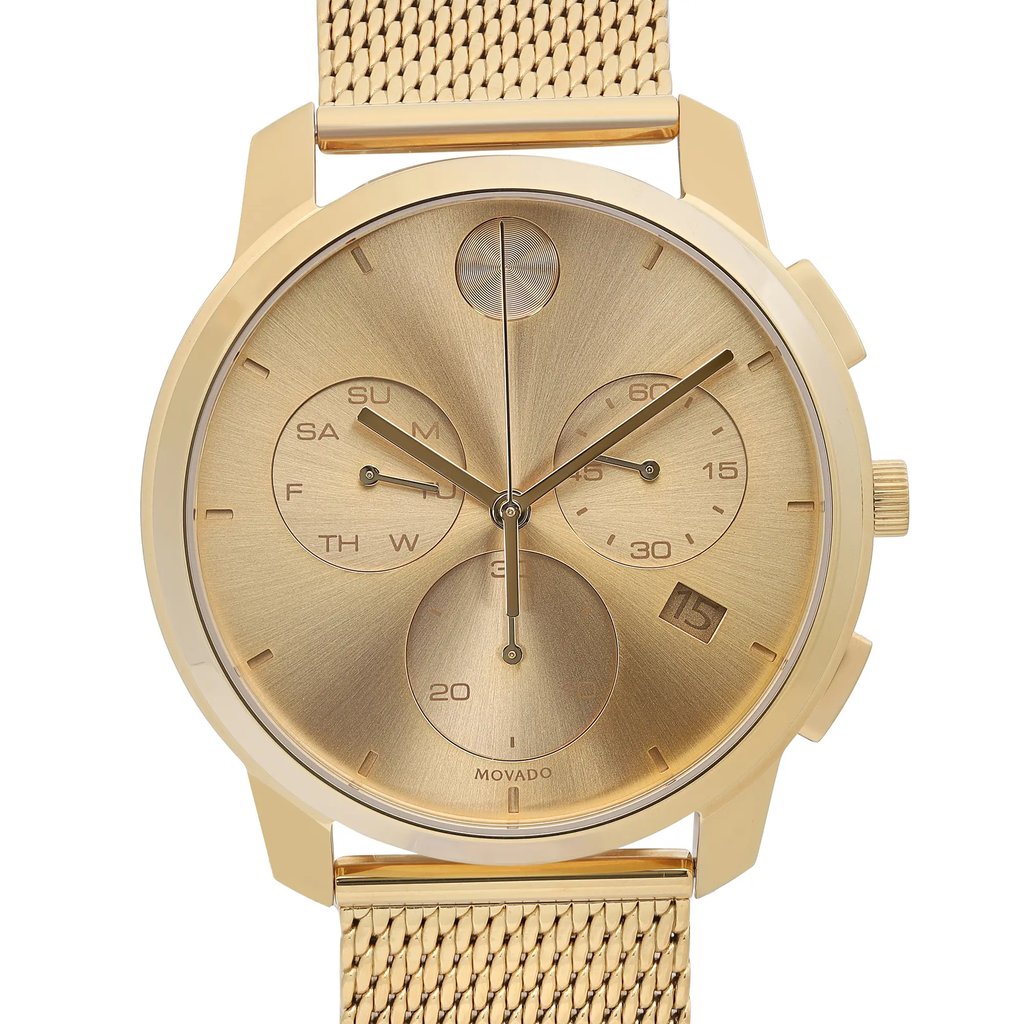 An image of a pre-owned wristwatch, viewed from the front in a close-up shot, showcasing the watch face. The watch features a gold-toned dial with three subdials and a date window. The mesh strap is visible at the top and bottom, complementing the elegant design.