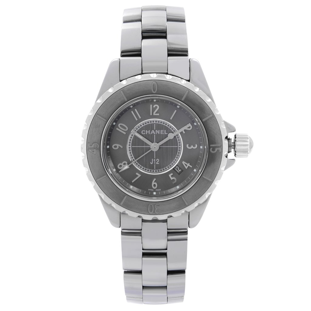 An image of a pre-owned wristwatch viewed from the front at a full frontal angle. The watch features a polished metal bracelet and a round dial with numeric markers. The crown is visible on the right side of the watch case. The watch face displays the brand name and model "J12" at the center.