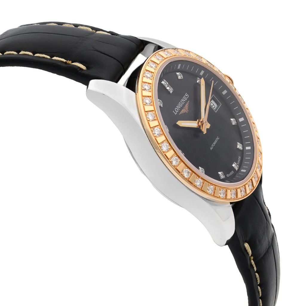 An image of a wristwatch taken from a side profile view, showcasing the opposite side of the crown. The watch features a black leather strap with visible stitching. The case is silver with a gold bezel adorned with small diamonds. The dial is black with gold hands and diamond hour markers. The photo is taken at a slight upward angle, highlighting the watch's elegant design and luxurious details.