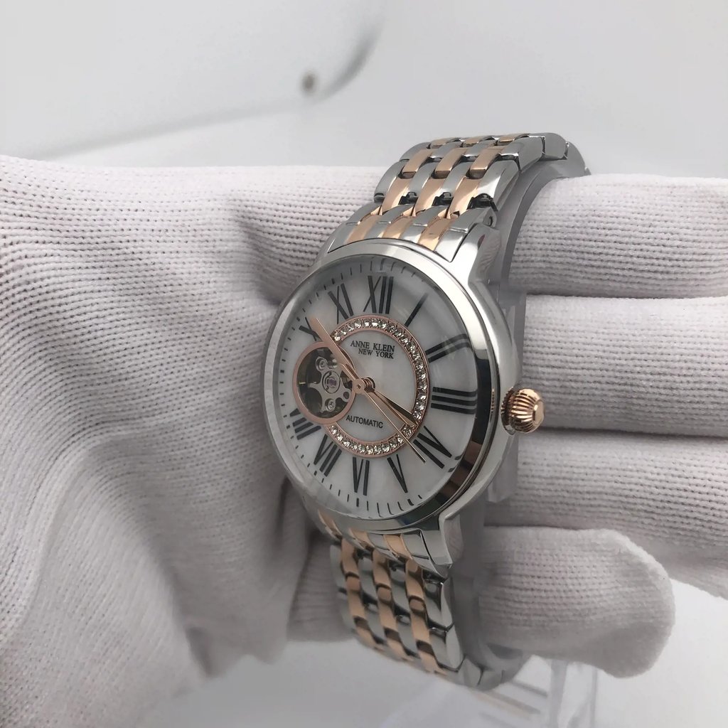 View Of Crown Facing Side Of Anne Klein 12/2339MPRT Stainless Steel Watch New With Defects Condition