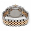 An image of a pre-owned unisex Rolex wristwatch, viewed from the back at a slightly elevated angle. The focus is on the stainless steel and gold bracelet, with the closed clasp prominently displayed in the foreground. The watch case and crown are visible at the top center of the image, highlighting the watch's two-tone design.
