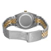 An image of a pre-owned men's Rolex wristwatch showcasing the back view with an open clasp. The watch features a round stainless steel case with a screwback. The band is composed of stainless steel and solid gold links, offering a luxurious two-tone appearance. The fold-over clasp is visible, engraved with the Rolex logo. The angle is straight-on from the back, displaying the watch at a close distance, highlighting its materials and design features.
