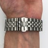 Back View Of Exhibition Back Case And Closed Stainless Steel Band Of RAYMOND WEIL 2710-ST-65031 Watch New Condition
