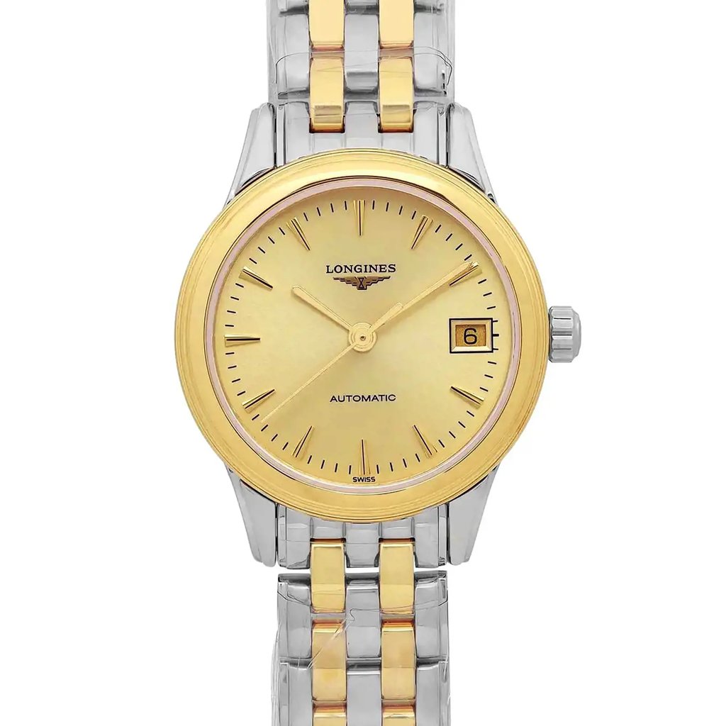 An image of a new wristwatch captured in a front close-up shot. The watch face is prominently displayed, featuring a gold bezel and a matching gold dial with minute markers and a date window at the 3 o'clock position. The band is a two-tone metal bracelet, combining silver and gold elements. The angle provides a detailed view of the watch's face and part of the band.