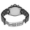 An image of a pre-owned wristwatch viewed from the back, showing the open clasp. The watch is positioned upright, with its metallic links and clasp prominently displayed. The angle captures the flat back of the watch case and the open bracelet, revealing a detailed view of the intricate link design. The photo is taken at a close distance to emphasize the craftsmanship of the watch.