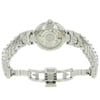An image of a pre-owned TAG Heuer women's wristwatch, showcasing the back view with an open clasp. The stainless steel case features an exhibition caseback, revealing the watch's inner mechanics. The round watch shape complements the matching stainless steel band. The double-locking fold-over clasp is prominently displayed in the foreground, with the watch positioned at a slightly elevated angle, capturing the details of the clasp and band from a close distance.