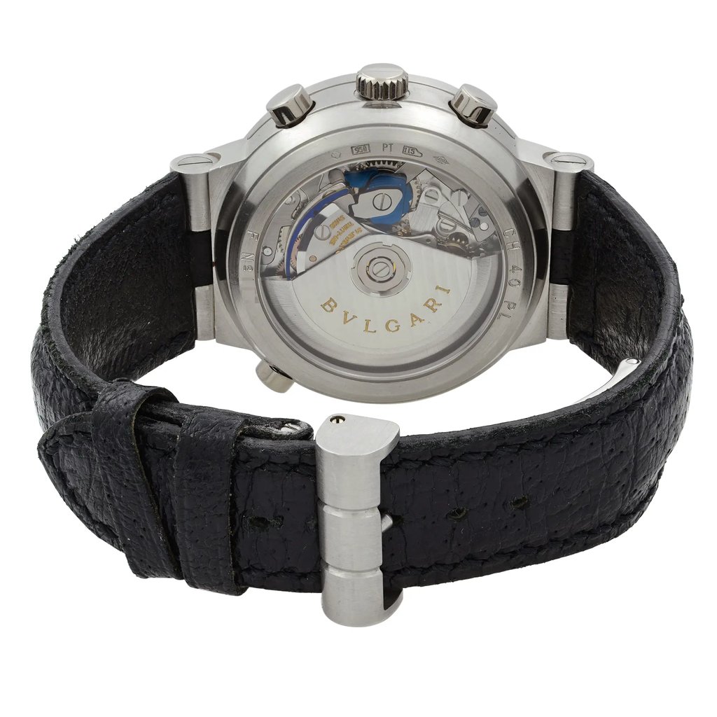 An image of a pre-owned men's Bvlgari wristwatch, viewed from the back at a slight angle to show the transparent case back and internal mechanics. The watch features a chronograph and a small seconds subdial. It has a black leather strap with a visible buckle, captured from a close distance.