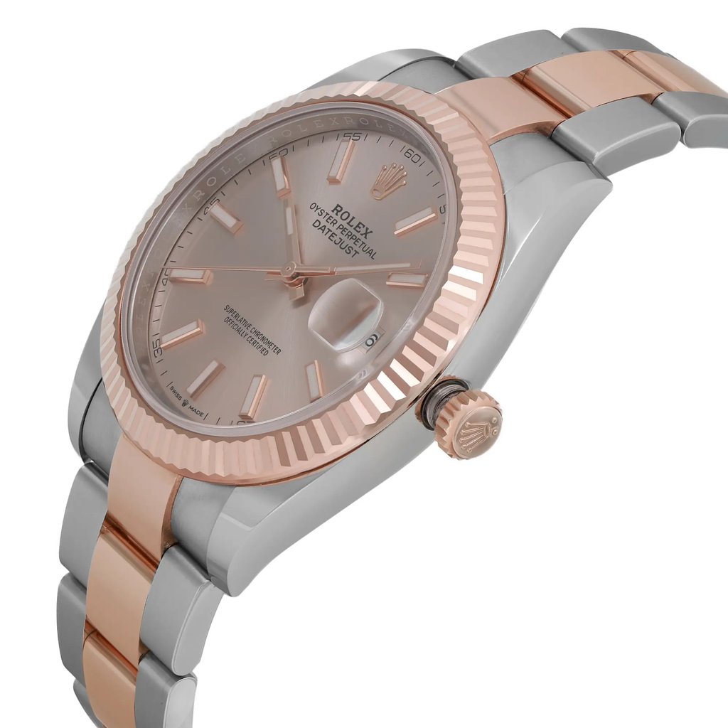 An image of a men's Rolex wristwatch, luxury style, shown in a side profile view emphasizing the crown. The watch features a round sundust dial with rose gold bezel and date indicator, luminous hands, and a combination of rose gold and stainless steel in the band and case. The watch is positioned at a slight angle, focusing on the side, with the crown prominently displayed, set against a neutral background. This is a display model, viewed from a medium distance, showcasing the watch's design and materials.